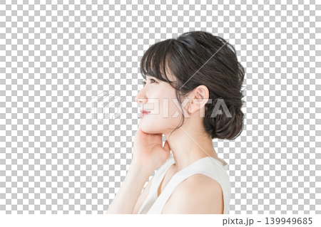 Profile view of a beautiful Asian woman with flawless skin applying skincare products (Beauty, spa, skincare image) Profile view of a beautiful Asian woman with flawless skin applying skincare products (Beauty, spa, skincare image) 139949685