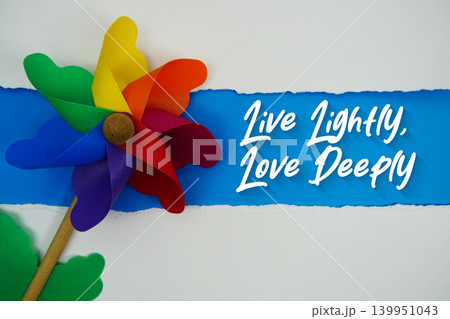 Live Lightly, Love Deeply motivational and inspirational quotes message on blue background Live Lightly, Love Deeply motivational and inspirational quotes message on blue background 139951043
