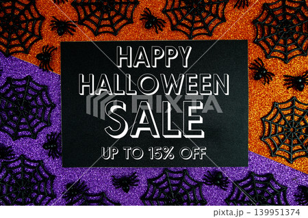Happy Halloween Sale 15% Off with Price Tag and Halloween elements decorated on purple and orange background 139951374