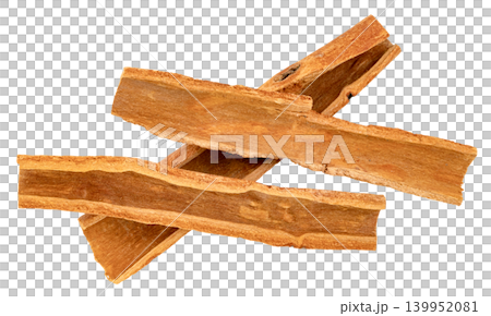Three pieces of dried cinnamon bark isolated. Natural aromatic spice used for cooking and baking. Top view of organic cassia bark strips. High resolution macro shot. 139952081