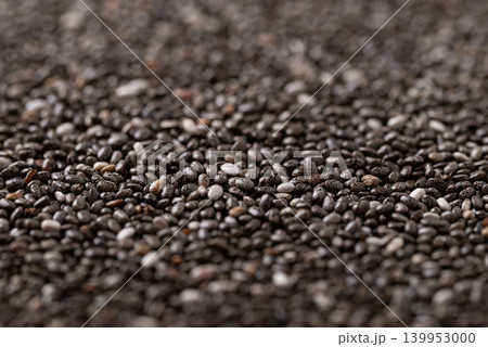 Close up of healthy organic chia seeds texture for background Close up of healthy organic chia seeds texture for background 139953000