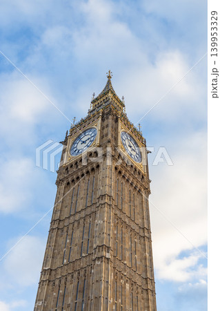 Big Ben clock tower against a blue sky in London Big Ben clock tower against a blue sky in London 139953329