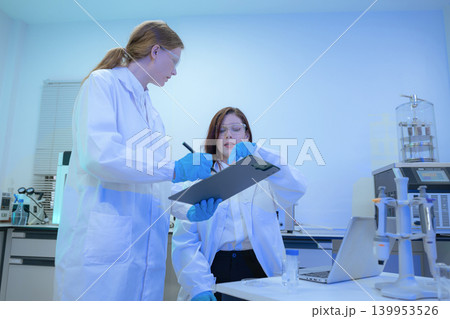 Diverse Scientists Conduct Biotechnology Research in Modern Laboratory 139953526