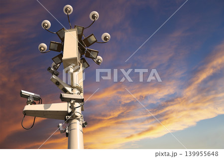 Street lamp on Tiananmen Square in Beijing, China (against the sunset), with propaganda or public announcement speakers Street lamp on Tiananmen Square in Beijing, China (against the sunset), with propaganda or public announcement speakers 139955648