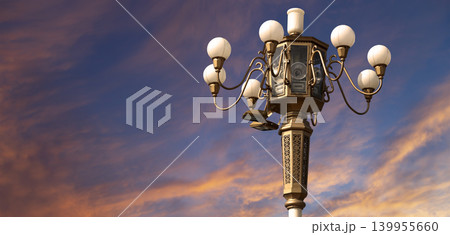 Street lamp on Tiananmen Square in Beijing, China (against the sunset), with propaganda or public announcement speakers Street lamp on Tiananmen Square in Beijing, China (against the sunset), with propaganda or public announcement speakers 139955660