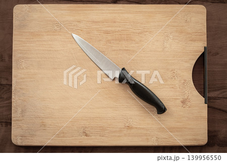 Food Prep With Cutting Board And Knife. Home Chef Arranged Ingredients On Rustic Wooden Surface 139956550