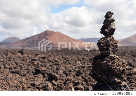 abstract sculpture made of volcanic stone in the national park of Timanfaya (Lanzarote, Spain) abstract sculpture made of volcanic stone in the national park of Timanfaya (Lanzarote, Spain) 139956898
