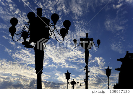 Street lamp on Tiananmen Square in Beijing, China (against the background of a beautiful sky with clouds), with propaganda or public announcement speakers 139957120
