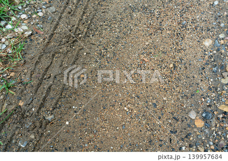 Tire Tracks on Gravel and Dirt Path Tire Tracks on Gravel and Dirt Path 139957684