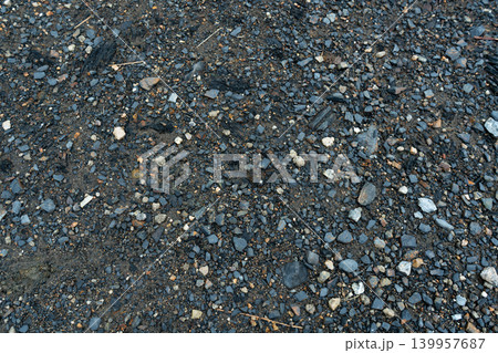 Dark Gravel and Crushed Stone Ground Texture Dark Gravel and Crushed Stone Ground Texture 139957687