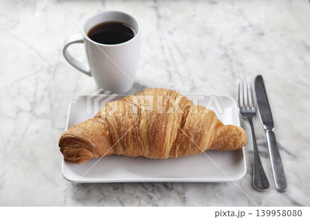 Croissant, Coffee and Jam on Marble Surface. Croissant, Coffee and Jam on Marble Surface. 139958080