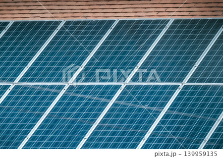 Residential houses with rooftop solar panels, renewable energy for sustainable homes Residential houses with rooftop solar panels, renewable energy for sustainable homes 139959135