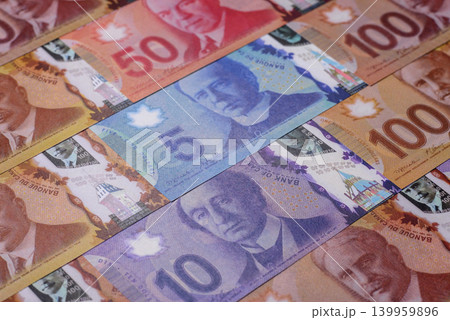 Money, currency of Canada, dollar banknotes of various denominations. Canadian money 139959896