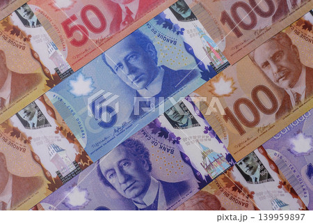 Money, currency of Canada, dollar banknotes of various denominations. Canadian money Money, currency of Canada, dollar banknotes of various denominations. Canadian money 139959897