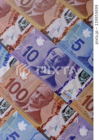 Money, currency of Canada, dollar banknotes of various denominations. Canadian money Money, currency of Canada, dollar banknotes of various denominations. Canadian money 139959899
