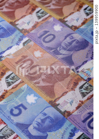 Money, currency of Canada, dollar banknotes of various denominations. Canadian money Money, currency of Canada, dollar banknotes of various denominations. Canadian money 139959900