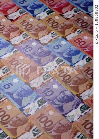 Money, currency of Canada, dollar banknotes of various denominations. Canadian money Money, currency of Canada, dollar banknotes of various denominations. Canadian money 139959902