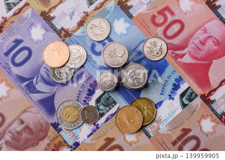 Money, currency of Canada, dollar banknotes of various denominations. Canadian money Money, currency of Canada, dollar banknotes of various denominations. Canadian money 139959905
