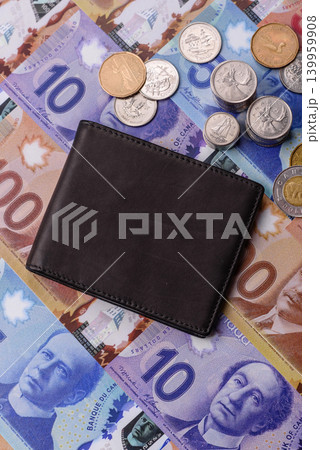 Canada, Canadian dollar, paper money and coins, financing exchange, trade. Canadian currency Canada, Canadian dollar, paper money and coins, financing exchange, trade. Canadian currency 139959908