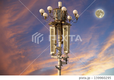 Street lamp on Tiananmen Square in Beijing, China (against the sunset with the super moon), with propaganda or public announcement speakers 139960295