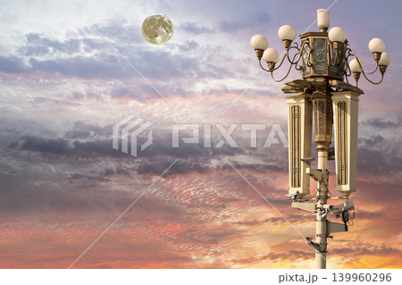 Street lamp on Tiananmen Square in Beijing, China (against the sunset with the super moon), with propaganda or public announcement speakers 139960296