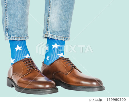 Men's legs and blue socks with white stars 139960390