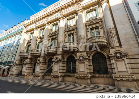 Historic ornate building facade with columns in Lisbon city center 139960414