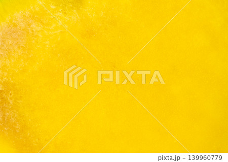 Abstract background of juicy yellow mango fruit flesh. Abstract background of juicy yellow mango fruit flesh. 139960779