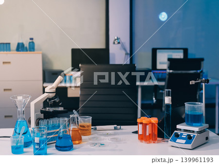 Lab technician experimenting in lab Lab technician experimenting in lab 139961193
