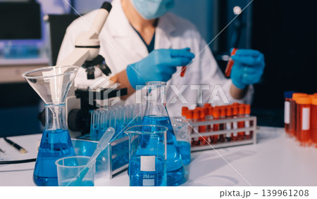 Lab technician experimenting in lab Lab technician experimenting in lab 139961208