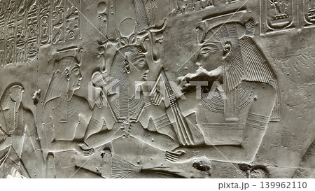 Beautiful bas-reliefs and ancient hieroglyphs in the Temple of Seti I in Abydos, Egypt. Beautiful bas-reliefs and ancient hieroglyphs in the Temple of Seti I in Abydos, Egypt. 139962110