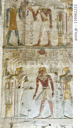 Beautiful bas-reliefs and ancient hieroglyphs in the Temple of Seti I in Abydos, Egypt. 139962223