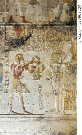 Beautiful bas-reliefs and ancient hieroglyphs in the Temple of Seti I in Abydos, Egypt. Beautiful bas-reliefs and ancient hieroglyphs in the Temple of Seti I in Abydos, Egypt. 139962224