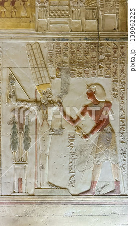 Beautiful bas-reliefs and ancient hieroglyphs in the Temple of Seti I in Abydos, Egypt. Beautiful bas-reliefs and ancient hieroglyphs in the Temple of Seti I in Abydos, Egypt. 139962225