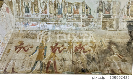 Beautiful bas-reliefs and ancient hieroglyphs in the Temple of Seti I in Abydos, Egypt. 139962423