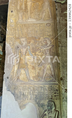 Beautiful bas-reliefs and ancient hieroglyphs in the Temple of Seti I in Abydos, Egypt. 139962428