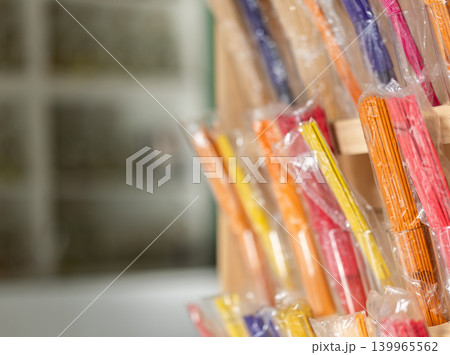 Showcase contains large assortment of aroma sticks Showcase contains large assortment of aroma sticks 139965562