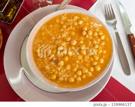 Hearty and rich soup made from chickpeas and rice Hearty and rich soup made from chickpeas and rice 139966137