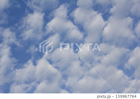 The sky is covered with fluffy clouds The sky is covered with fluffy clouds 139967764