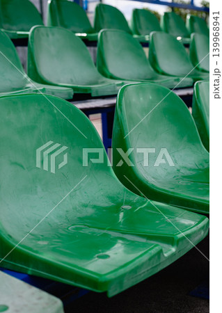 Empty Green Stadium Seats At Sports Arena Empty Green Stadium Seats At Sports Arena 139968941