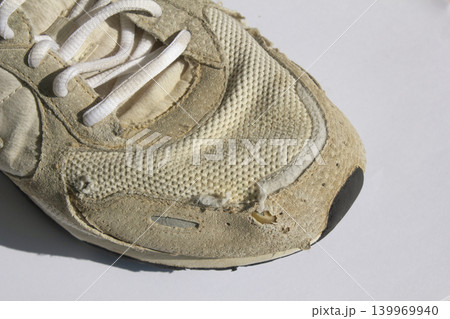 It is an old sneaker. 139969940