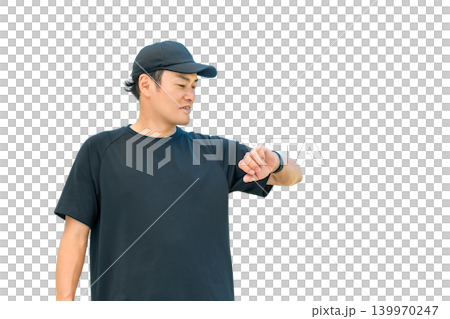 A middle-aged man in sportswear uses a smartwatch for health management and healthcare. A middle-aged man in sportswear uses a smartwatch for health management and healthcare. 139970247
