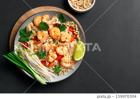 Pad Thai noodles with shrimps, prawns. Traditional thai meal. Pad Thai noodles with shrimps, prawns. Traditional thai meal. 139970304