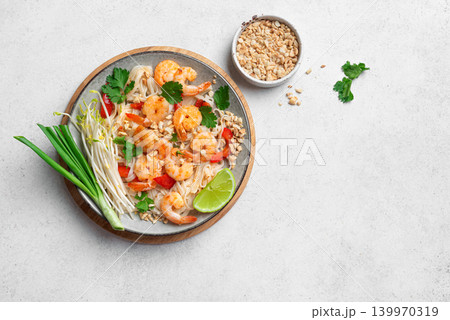 Pad Thai noodles with shrimps, prawns. Traditional thai meal. Pad Thai noodles with shrimps, prawns. Traditional thai meal. 139970319