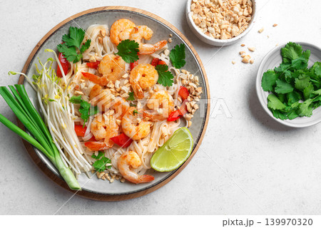 Pad Thai noodles with shrimps, prawns. Traditional thai meal. Pad Thai noodles with shrimps, prawns. Traditional thai meal. 139970320