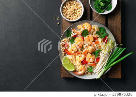 Pad Thai noodles with shrimps, prawns. Traditional thai meal. Pad Thai noodles with shrimps, prawns. Traditional thai meal. 139970326