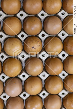 Fresh Eggs Organized Egg Carton Pattern Display, A photo of fresh eggs in egg carton pattern display, neatly arranged white eggs in cardboard, perfect for farm product or food documentary. Fresh Eggs Organized Egg Carton Pattern Display, A photo of fresh eggs in egg carton pattern display, neatly arranged white eggs in cardboard, perfect for farm product or food documentary. 139972618