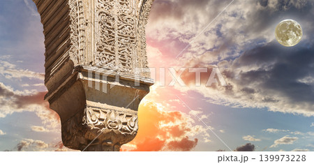 Columns in Islamic (Moorish) style in Alhambra (against the sunset with the super moon), Granada, Spain Columns in Islamic (Moorish) style in Alhambra (against the sunset with the super moon), Granada, Spain 139973228