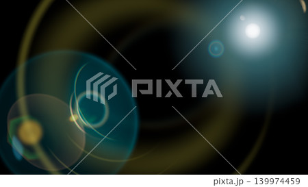 flare overlay light blue circular rings on black background, optical lens glow effect, realistic sunburst shimmer, professional photo editing beam, isolated teal glow light ray 139974459
