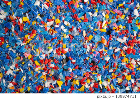 Plastic colorful pieces recycling shredded for industrial use. Plastic colorful pieces recycling shredded for industrial use. 139974711